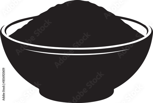 Black powder in a bowl on white background