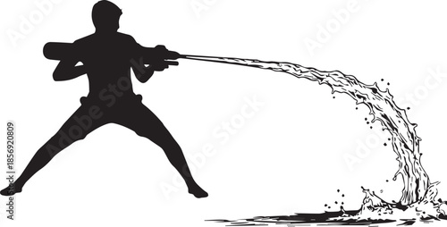 Firefighter in action spraying water