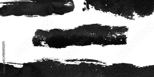 Various black brush strokes on a white background. Brush strokes vary in thickness and texture. brush stroke isolated on white background. 
