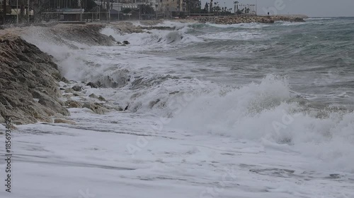 waves crashing on rocks near the sea 