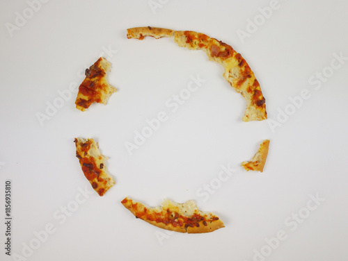 Wallpaper Mural Pizza Crust Leftovers Arranged in Circular Shape on White Background Showing Minimal Food Waste Concept After Eating Pizza Meal Torontodigital.ca