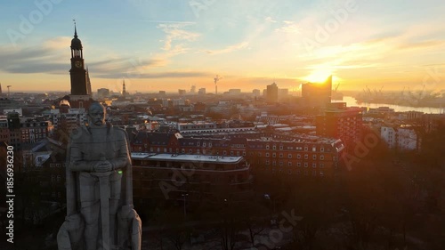 Aerial drone footage (reverse flight) of the famous Bismarck Memorial at sunrise in Hamburg