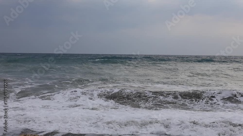 waves crashing on rocks near the sea 