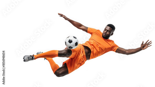 Soccer player in mid air kicking a ball isolated on transparent background