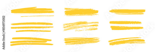 Set of twelve yellow brush stroke highlights isolated on white background with dry rough edges and smooth flat paint lines artistic design elements vector illustration
