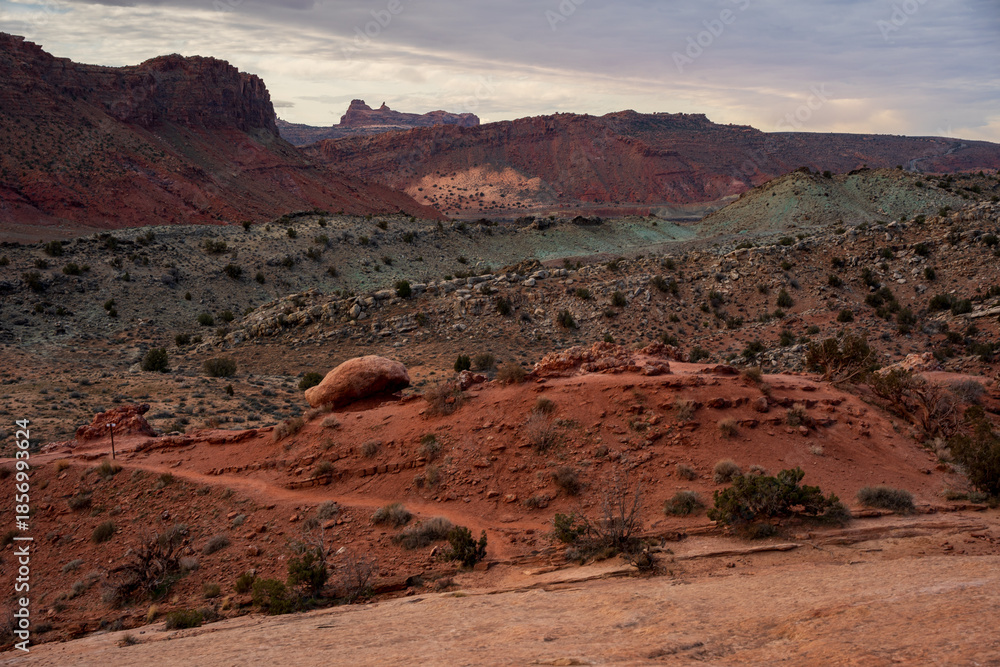 Fototapeta premium This fine art photograph captures the timeless beauty of the sandstone arches of **Arches National Park**, located just outside Moab, one of the most iconic landscapes in the American Southwest. C