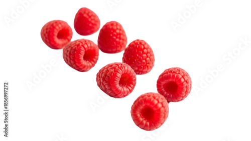 Raspberries on a black background a cluster of juicy red fruits