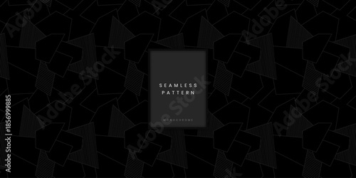 Seamless monochrome pattern with black angular mosaic shapes and grey hatching lines on dark background for modern textile or surface design