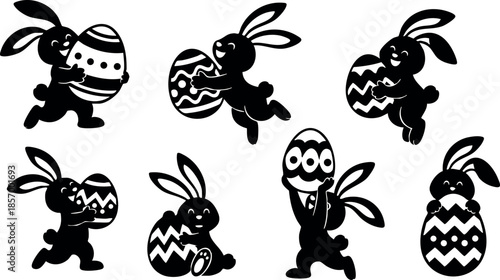Easter bunny silhouettes holding decorated eggs in black vector illustration set 
