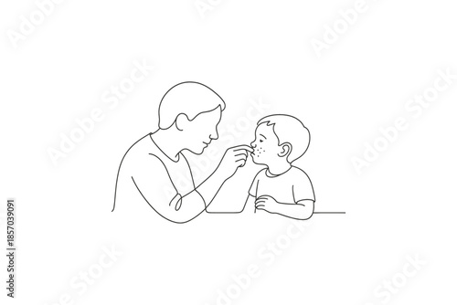 Parent gently applying cream to child's face with acne or blemishes