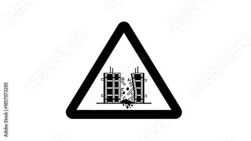A warning sign depicting two buildings collapsing, indicating danger or demolition ahead.