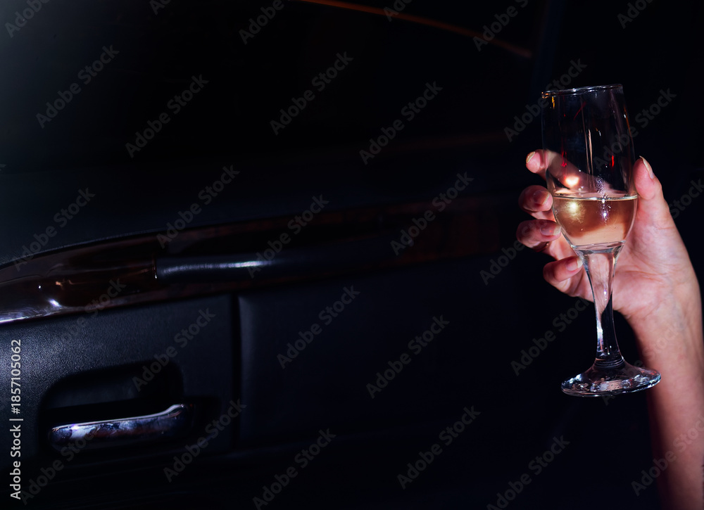 custom made wallpaper toronto digitalLuxury Leisure: Elegant Hand Holding Champagne Glass Inside Car During Night Out Celebration Emphasizing Sophistication and Exclusive Lifestyle Vibe