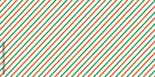 Christmas seamless pattern. Red and green diagonal stripes background. Candy cane repeating decoration wallpaper. Winter holiday lines backdrop. vector