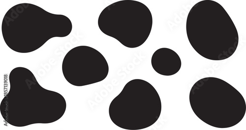 Black abstract splotches form a simple and clean cow print pattern