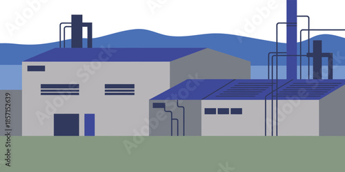 Industrial factory building with mountains in background