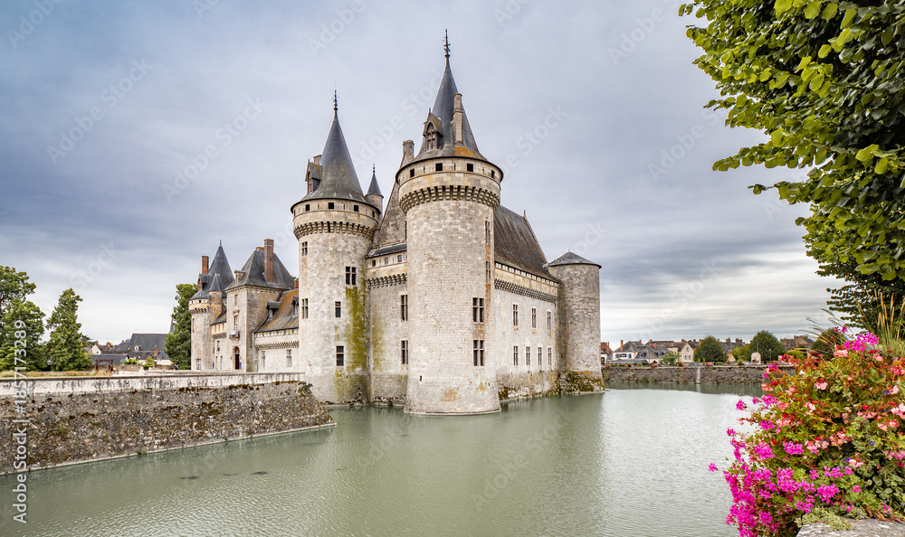 Fototapeta premium Medieval Castle with Towers Surrounded by Moat in France.