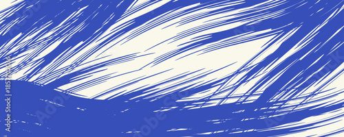 Grunge grainy blue brush stroke with spray texture. Hand drawn distress damaged vintage banner with zigzag bold line. Rough thick brush stroke texture.