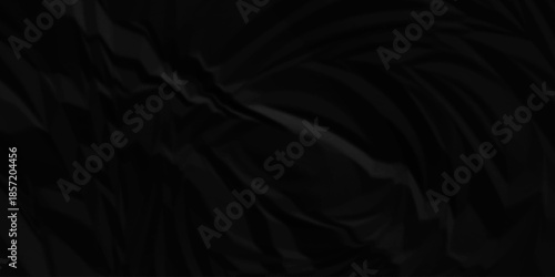 Dark black crumpled paper texture background. black crumpled and top view textures can be used for background of text or any contents.