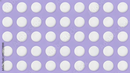 Grid of white circular pills on a purple background