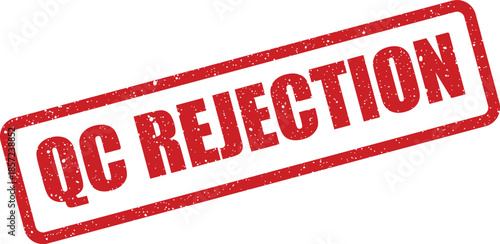 A textured red rubber stamp mark displaying the phrase QC REJECTION for industrial process documentation