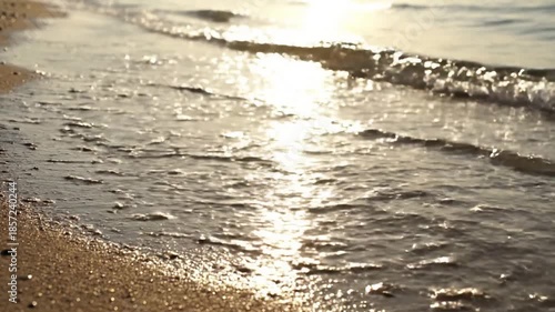 Glistening Wet Sand beach sparkle summer A macro or close up view of freshly wet sand on a summer beach, intensely sparkling and