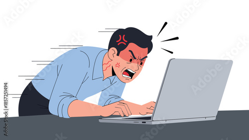 Stressed man angrily using a laptop.