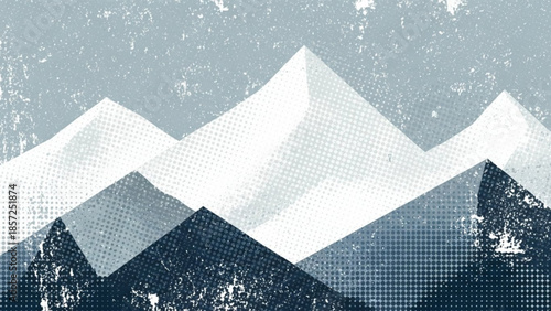 Snowy mountain range with rugged peaks and serene blue sky background