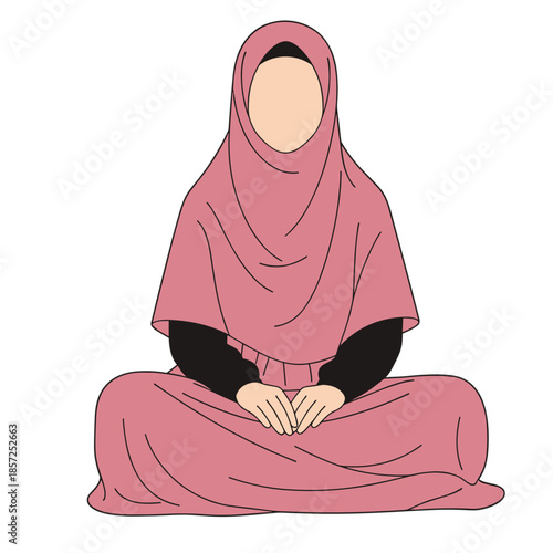 Muslim woman in hijab sitting peacefully in traditional attire.