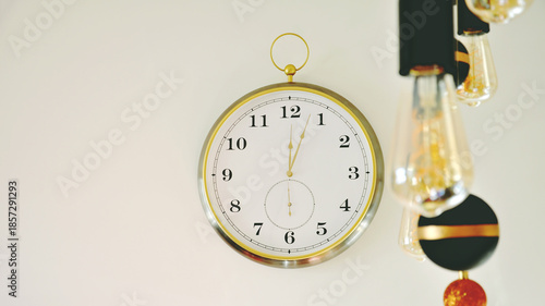 Photos Clock strikes twelve, minutes after midnight