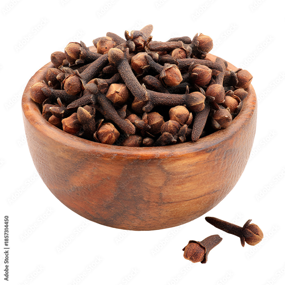 Fototapeta premium Aromatic Whole Dried Cloves in Wooden Bowl Spilled on White Background