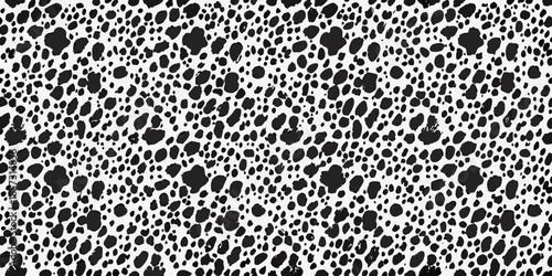 Abstract black and white speckled pattern with irregular organic shapes