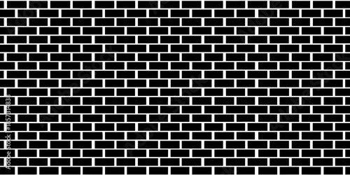 A seamless pattern of small dark and light rectangular blocks