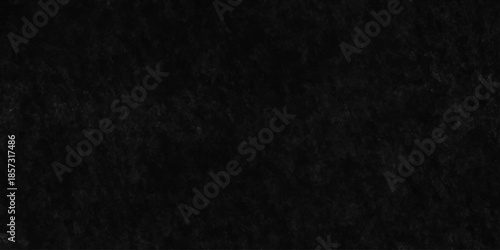 Dark grunge texture with deep black and charcoal tones, featuring rough, cracked surfaces and subtle scratches. cement concrete wall and ceramic tiles background. gray dirty stan, rusty metal texture.