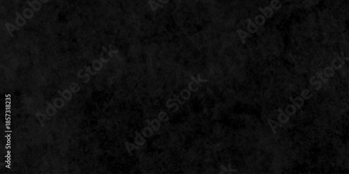 Dark grunge texture with deep black and charcoal tones, featuring rough, cracked surfaces and subtle scratches. cement concrete wall and ceramic tiles background. gray dirty stan, rusty metal texture.