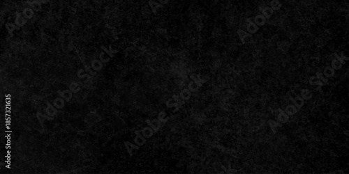 Black dark grunge stone texture with rough, natural crack wall surface background. uneven pattern resembling weathered black rock or charcoal. Panorama black canvas slate texture. marble background.
