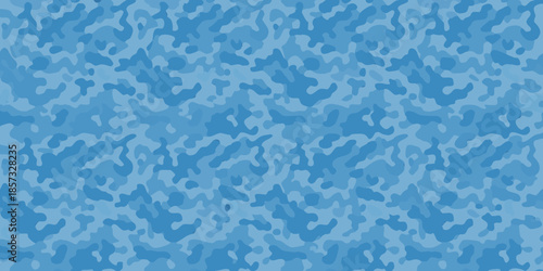 Abstract blue camouflage pattern with irregular shapes and varying shades