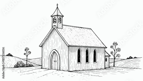Small traditional rural church in a field with bell tower and scenic landscape