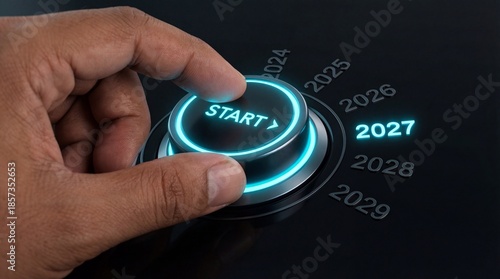 Wallpaper Mural A hand is shown pressing the start button on a futuristic dial displaying years from 2024 to 2029 highlighting 2027 Torontodigital.ca