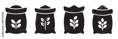Four black grain sacks with plant icons representing various agricultural products are neatly arranged in a row, symbolizing harvest and food production.