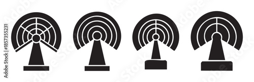Four black communication tower icons representing wireless technology, broadcasting, and global network connectivity for modern digital infrastructure.