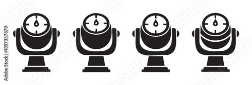 Four coin operated binoculars standing in a row for scenic observation and sightseeing at popular tourist destinations, offering a panoramic view.