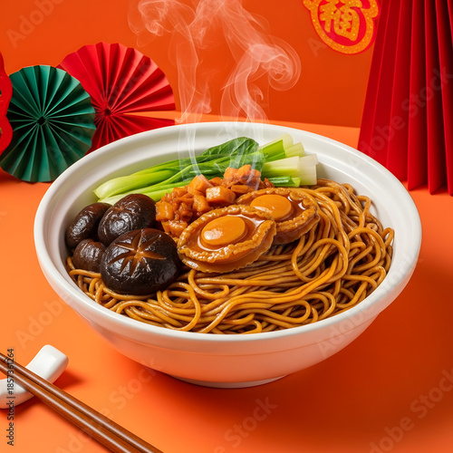 Steaming bowl of noodles with mushrooms and vegetables on vibrant orange background