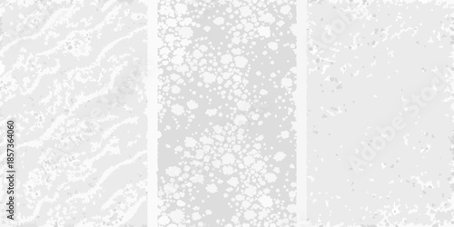 Abstract grayscale textures splattered paint and organic patterns on a light background