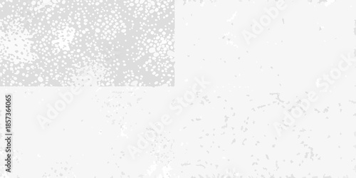 Abstract gray and white background with a textured speckled pattern shown