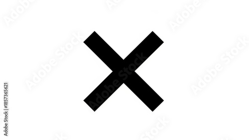 Cross Symbol: A simple yet powerful image of a bold, black cross set against a plain backdrop, evoking a sense of decision, choice, or perhaps elimination.