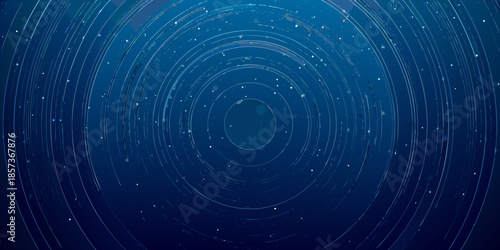 Abstract blue background with concentric circles and sparkling particle effects