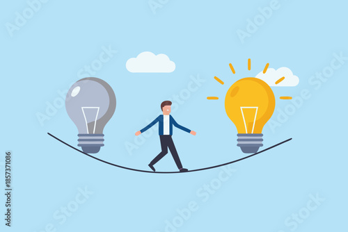 A businessman walking a tightrope between a dim and a bright lightbulb