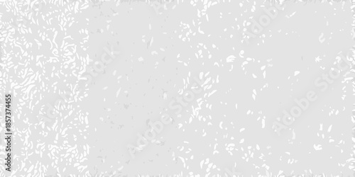 Abstract grayscale texture with a delicate uneven and slightly mottled pattern