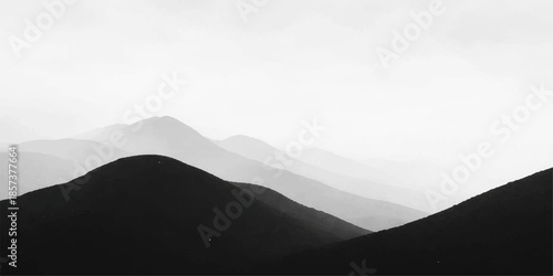 Mountain landscape with clouds and misty peaks