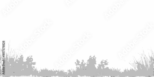 Silhouetted trees and grasses against a bright almost entirely white background